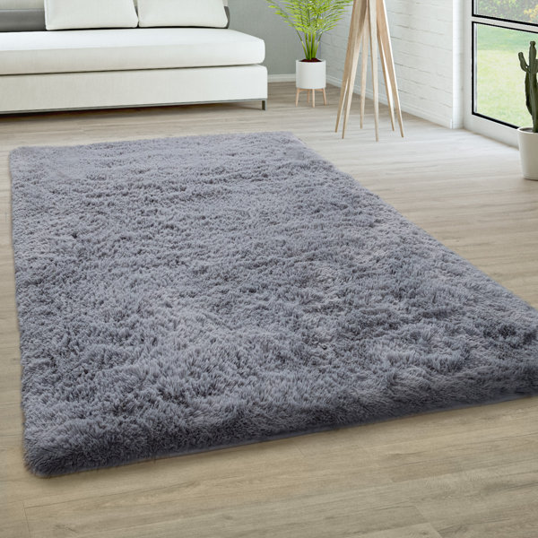 black and grey fluffy rug